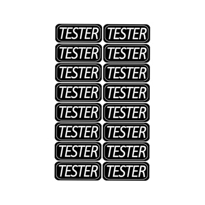 image of a sheet of black rectangular stickers with "Tester" in white letters